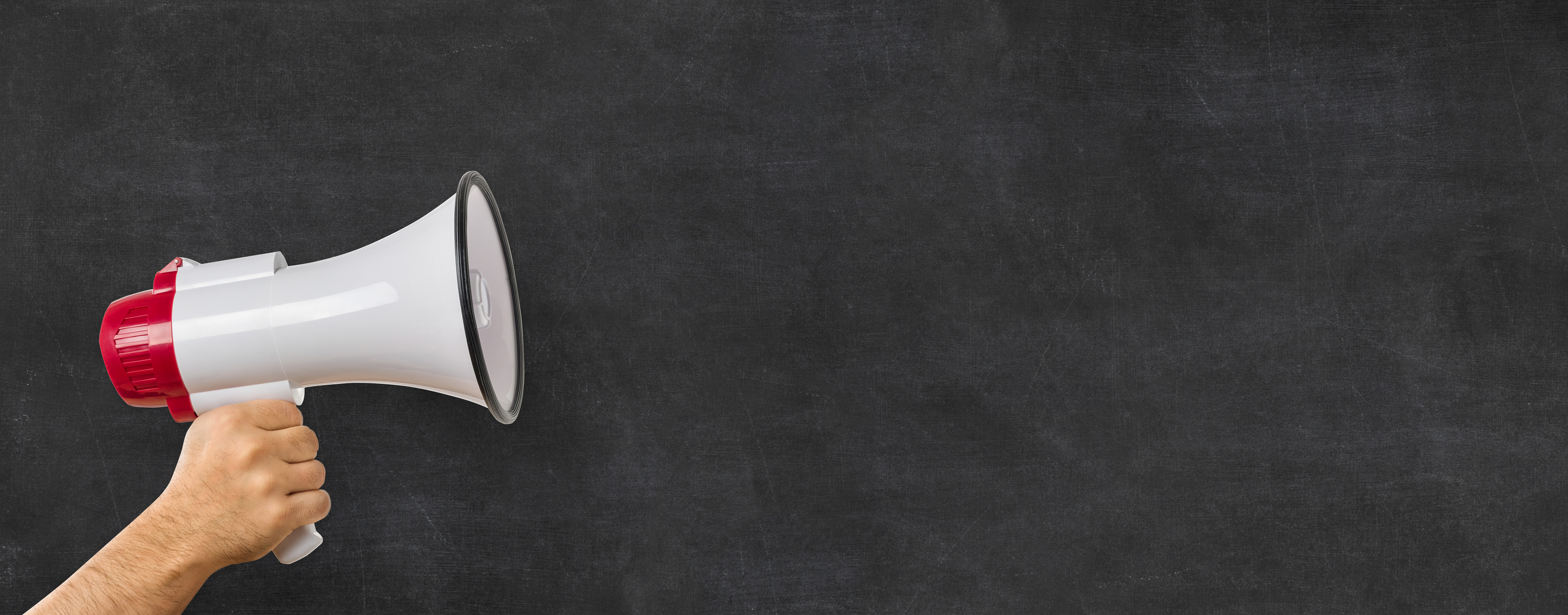 A Man Holding a Megaphone with Copyspace